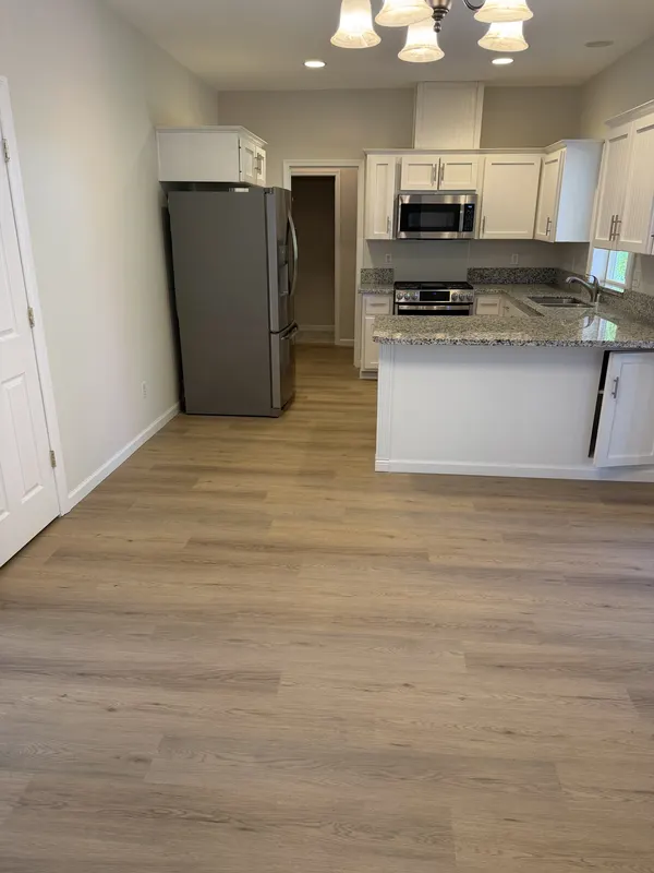 Laminate carried from a kitchen through into the dining area